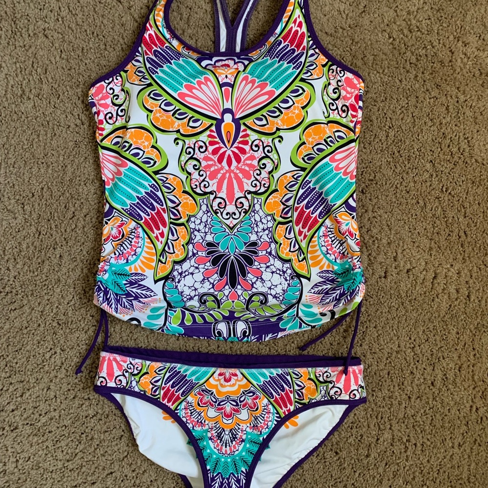 Woman’s Athleta Swimsuit medium